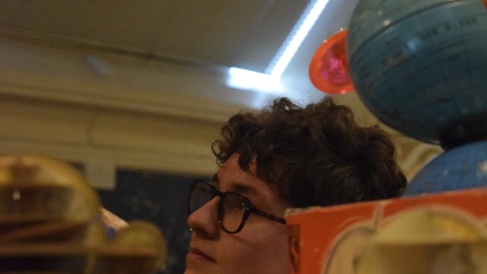 Keir Hesse looking upwards in a classroom