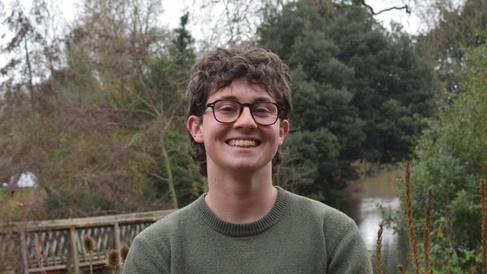 Keir Hesse standing in front of the river