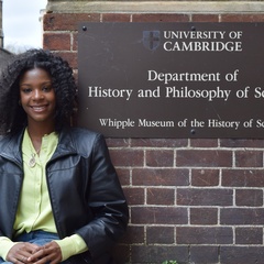 Maya Monthrope stands by the department sign