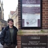 Keir Hess standing outside the entrance to the department